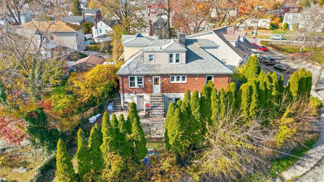 Terrific opportunity to own a Legal 4 Family Brick Home tucked away in the heart of East Yonkers, just 25 minutes north of Manhattan.