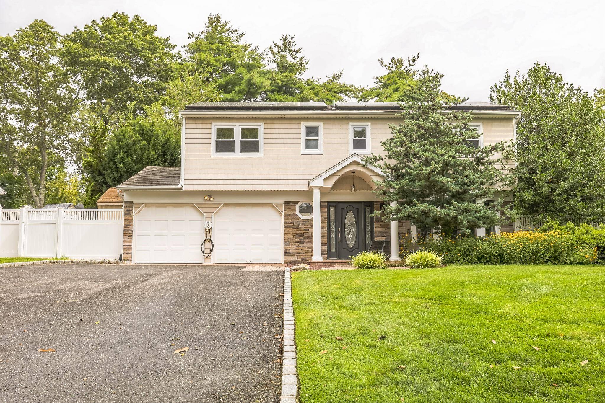 Beautifully Renovated 4 Bedroom Home in Commack LOCATION, LOCATION, LOCATION !