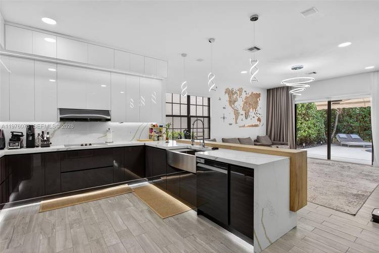 A rare opportunity to own a fully renovated single story residence in Parkland, thoughtfully redesigned with quality craftsmanship and refined finishes throughout.