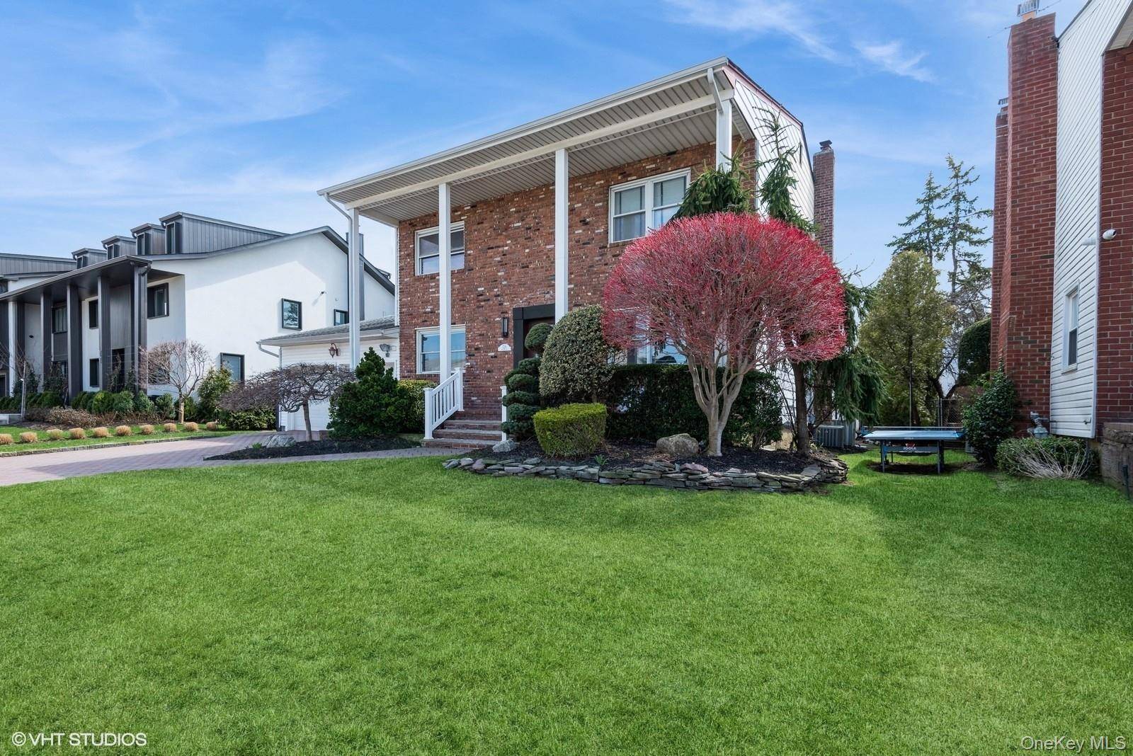 Located in one of North Woodmere's most desirable neighborhoods, this stunning Colonial home offers both luxury and convenience.