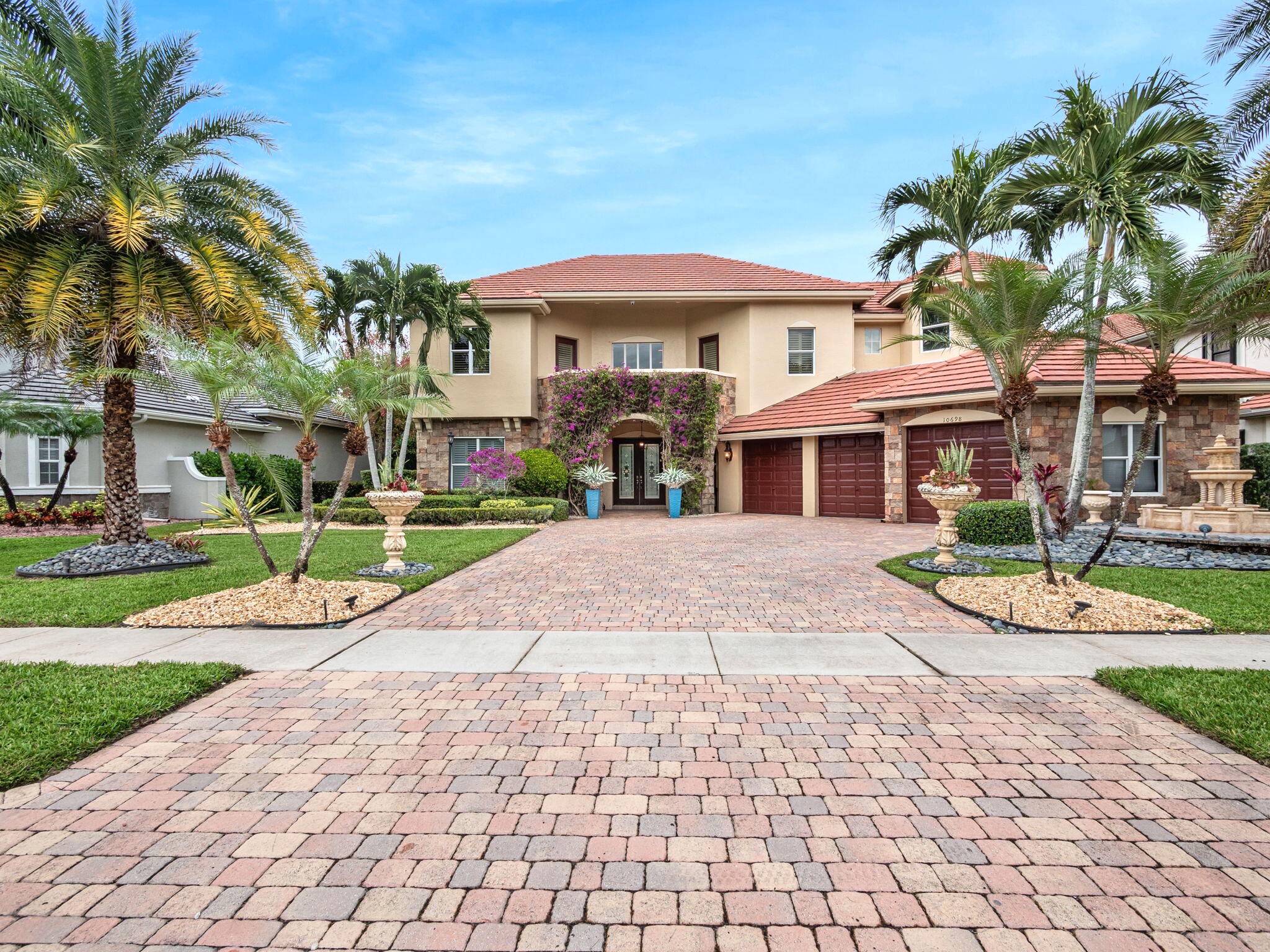 THIS EXQUISITE HOME FEATURES ENDLESS TRANQUIL LIVING SPACE INDOOR OUTDOOR ENTERTAINING SPACE LOCATED IN EXCLUSIVE VERSAILLES ESTATES 6 BEDROOM 4.