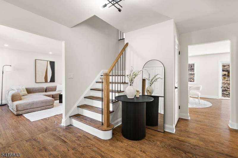 A beautifully reimagined home tucked away on a quiet cul de sac in Verona's desirable Brookdale section.