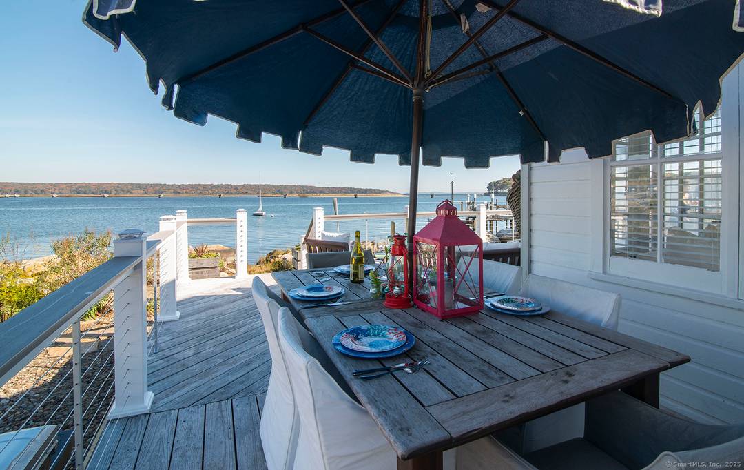 Enjoy an unforgettable vacation stay in this charming waterfront cottage that boasts stunning views of Bluff Point and Fishers Island Sound with access to beach, mooring, kayaks and bikes !