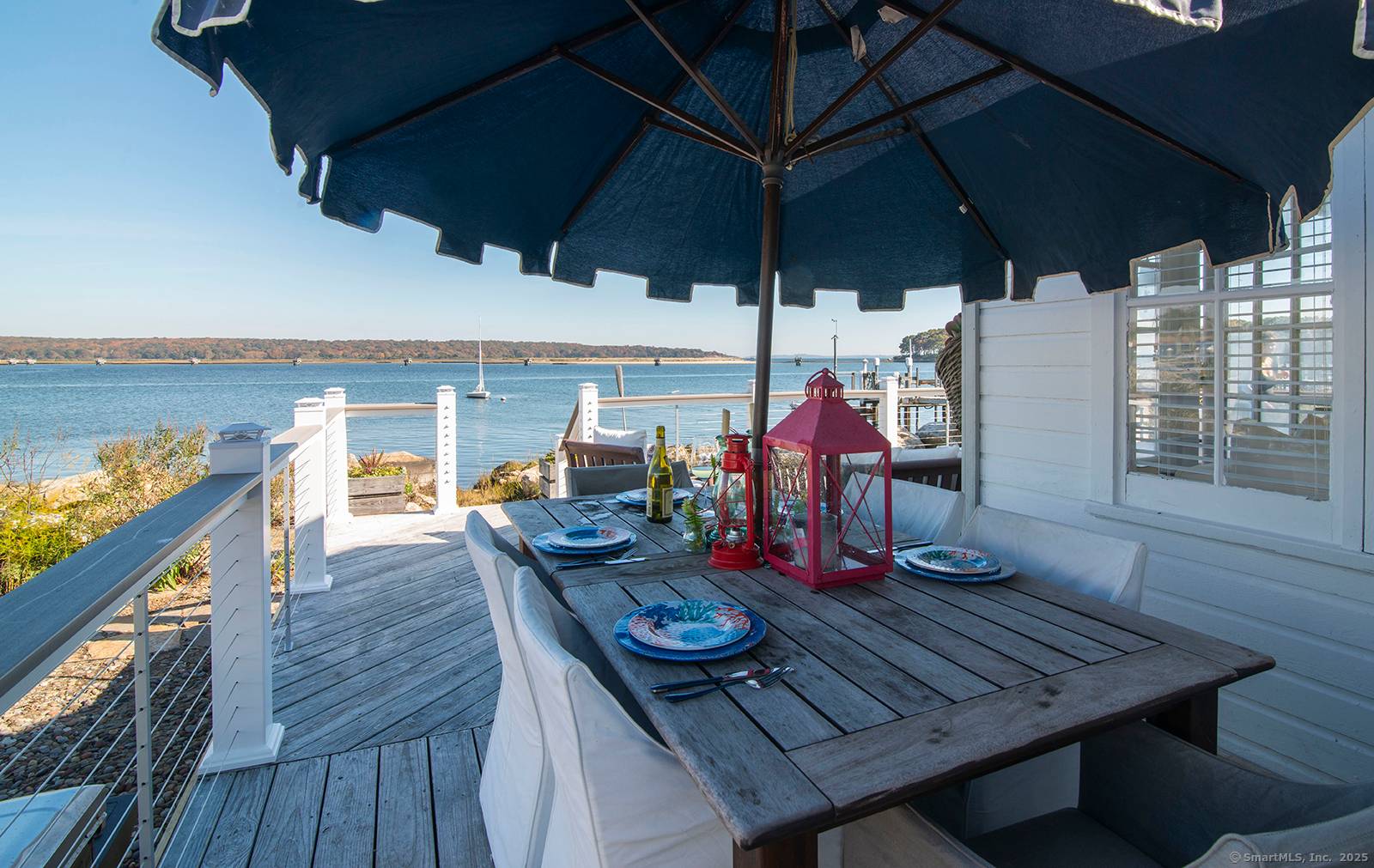 Enjoy an unforgettable vacation stay in this charming waterfront cottage that boasts stunning views of Bluff Point and Fishers Island Sound with access to beach, mooring, kayaks and bikes !