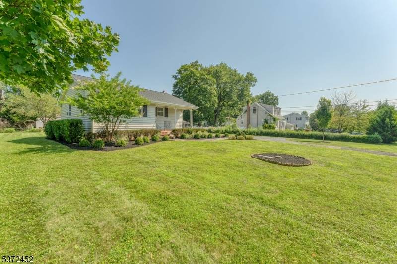 Discover the perfect alternative to townhome living with this charming ranch style home set on a flat and usable 0.