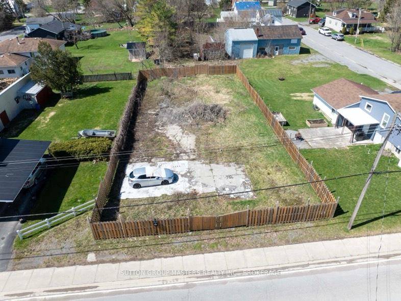 Discover the perfect opportunity to bring your business dreams to life with this versatile commercial lot located in the charming village of Enterprise.