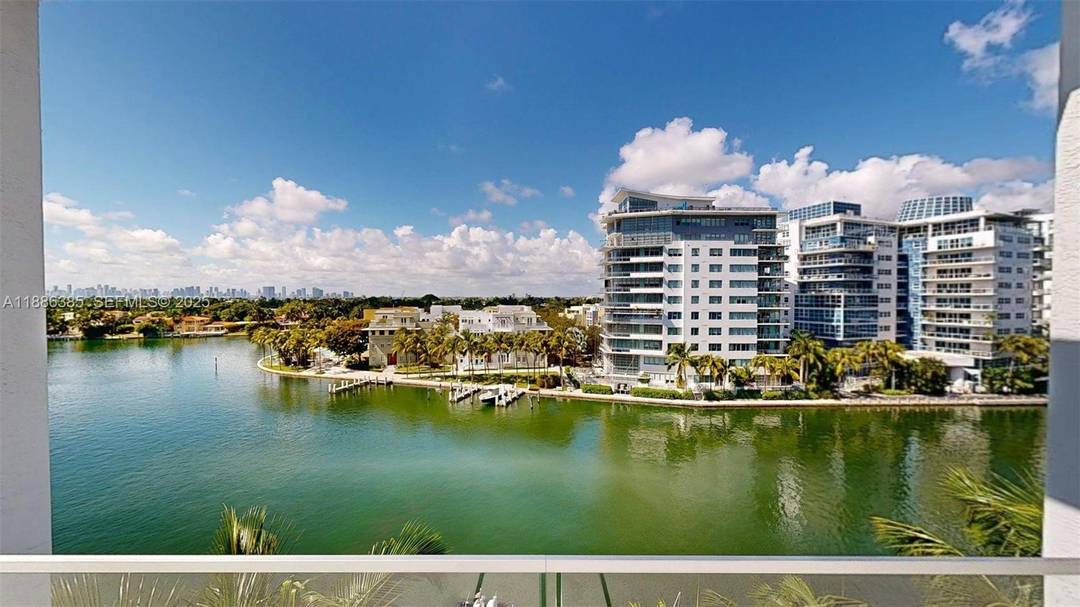 Miami Beach PH in front of the ocean in a modern boutique building.