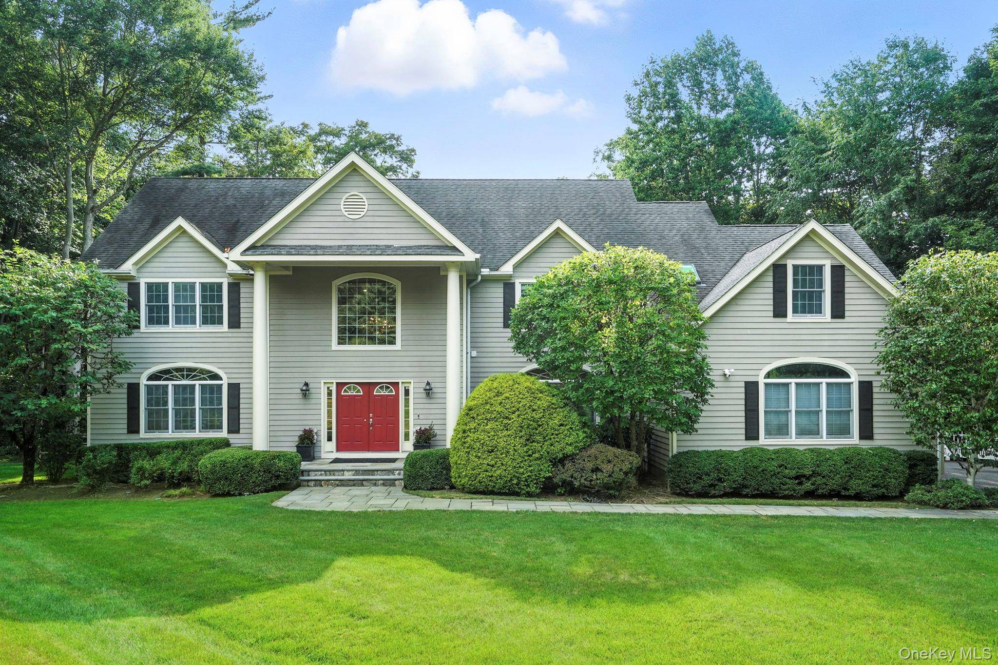 Elegant Colonial Living in the Heart of Briarcliff Manor.
