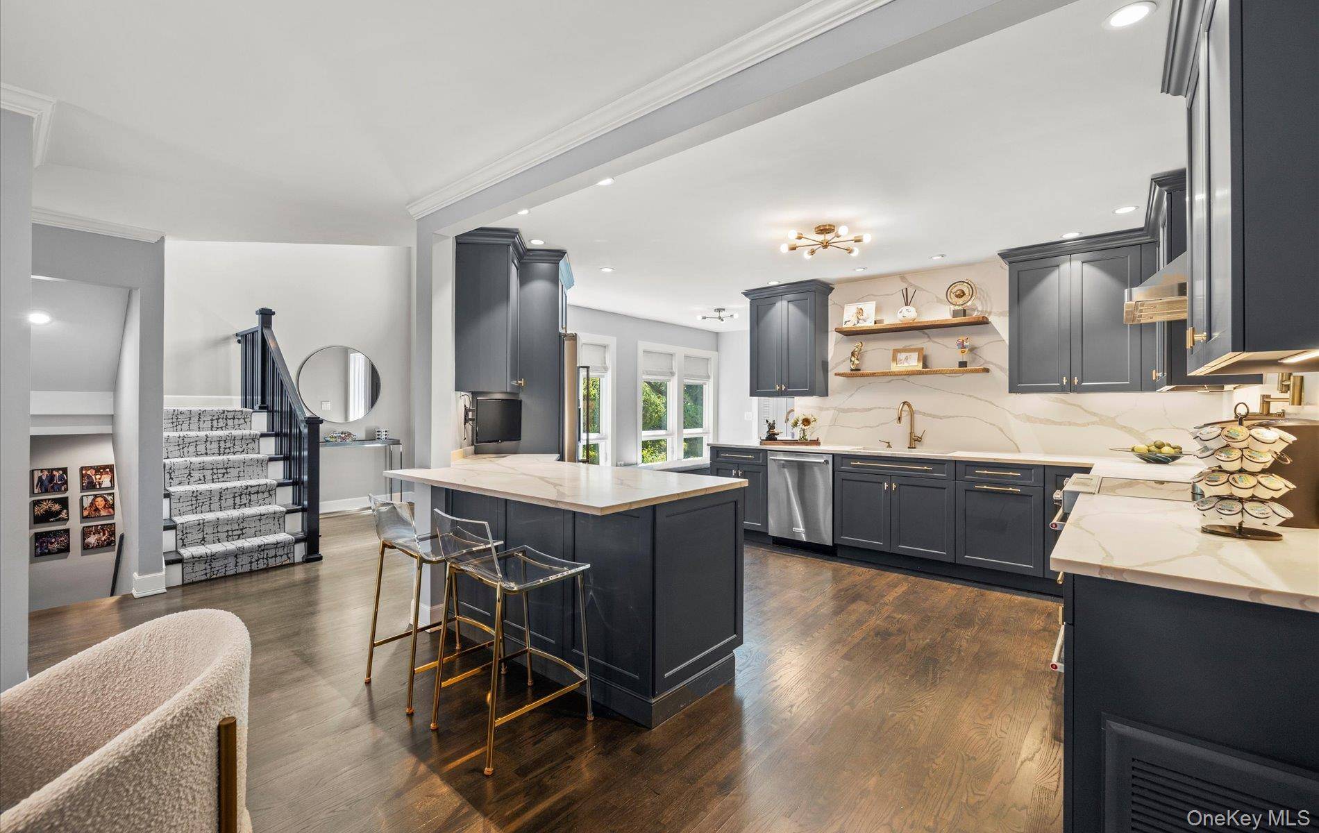 Welcome to 36 Carriage Lane, an exquisitely updated 3 bedroom, 2.