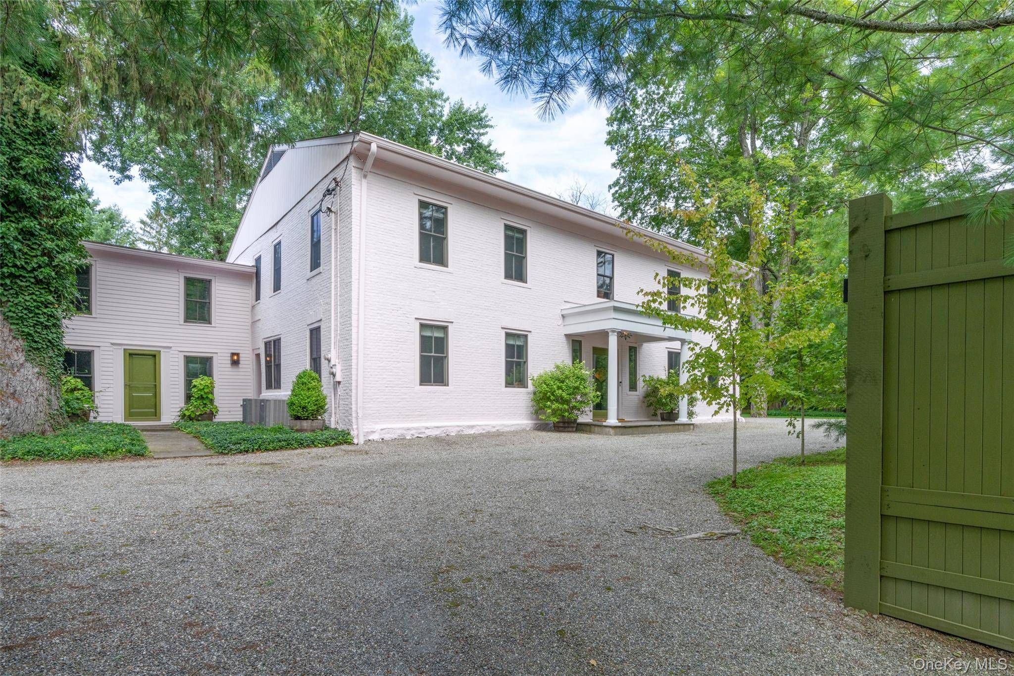 Nestled in the quaint hamlet of Clinton Corners, this rare and tasteful 18th century Georgian stone house offers classic proportions and timeless charm on beautifully established, landscaped grounds.