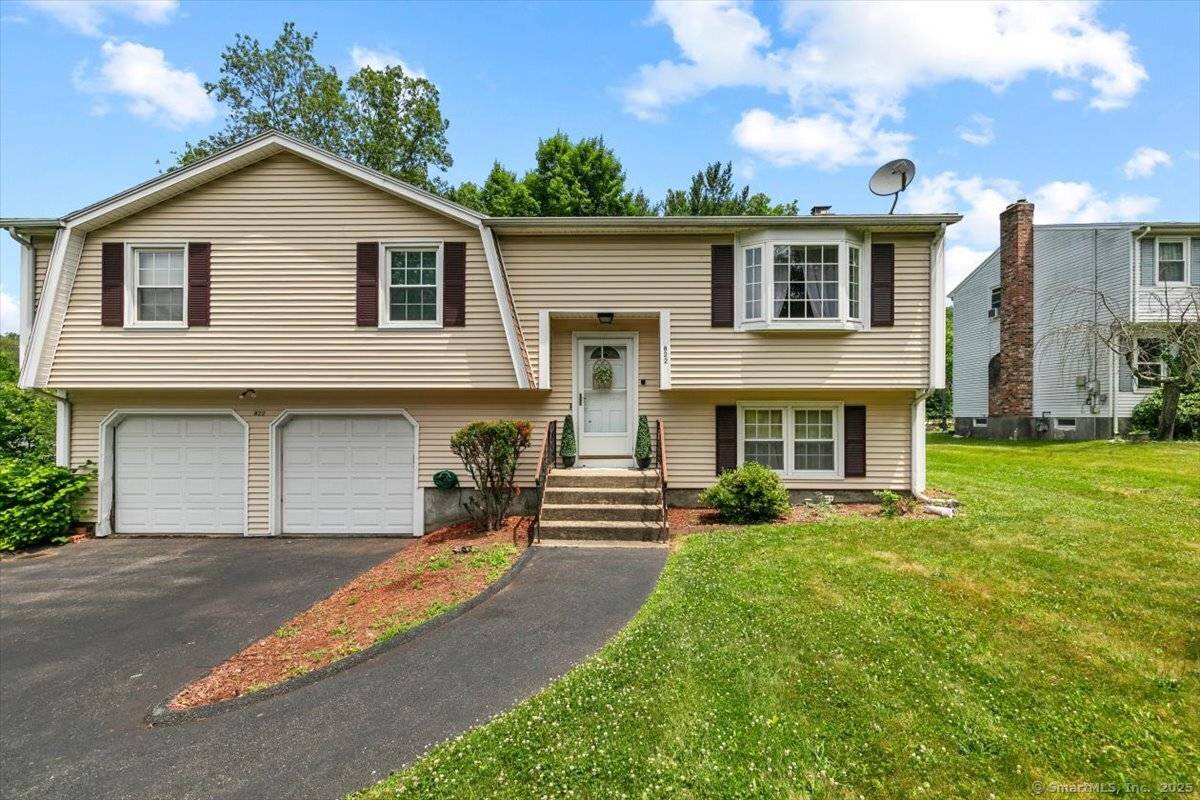 Welcome to 822 New Haven Avenue Discover this charming raised ranch nestled in the heart of Milford.