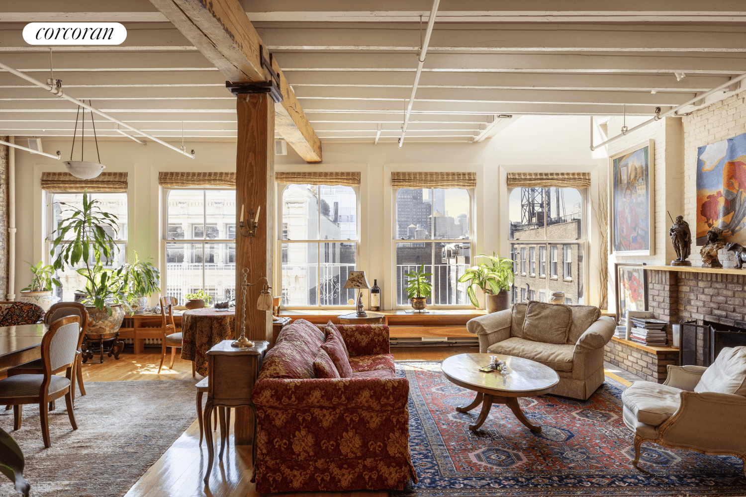 Take the key locked elevator into this quintessential penthouse loft bathed in southern light and featuring beamed ceilings, exposed brick walls, and picture postcard views of the neighboring cast iron ...