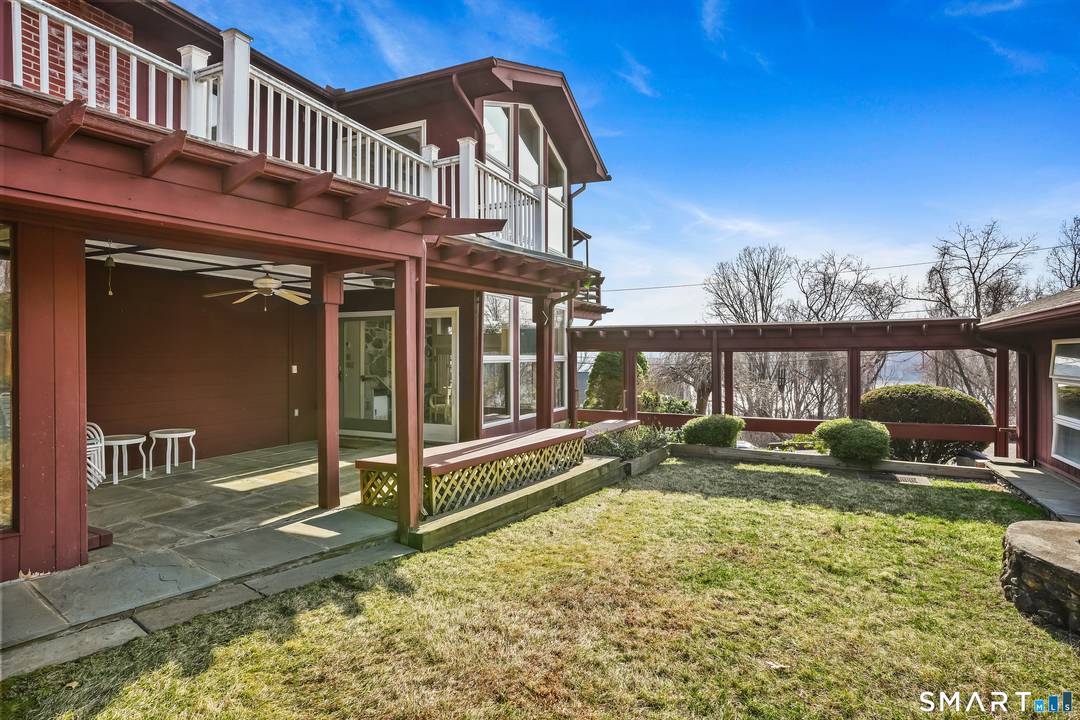 Discover this spacious and unique home in the highly sought after Candlewood Shores private lake community.