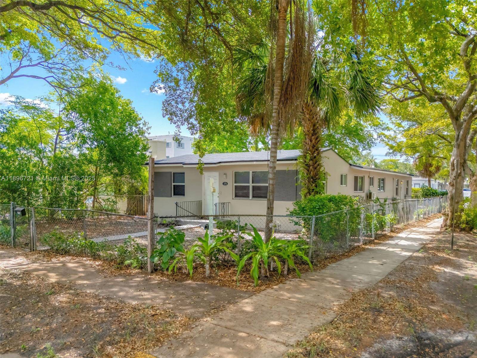 Discover this beautifully renovated corner duplex in the heart of Hollywood, FL !