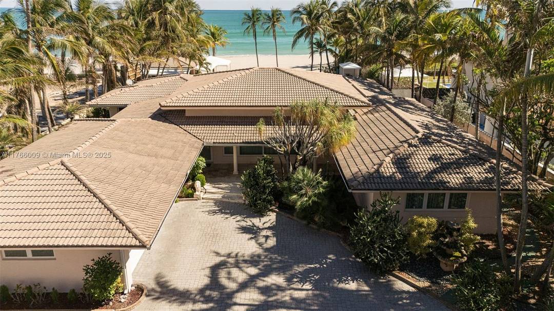 Experience exclusive coastal living in this one of a kind estate, situated on one of the last remaining double lots on the ocean in prestigious Golden Beach.