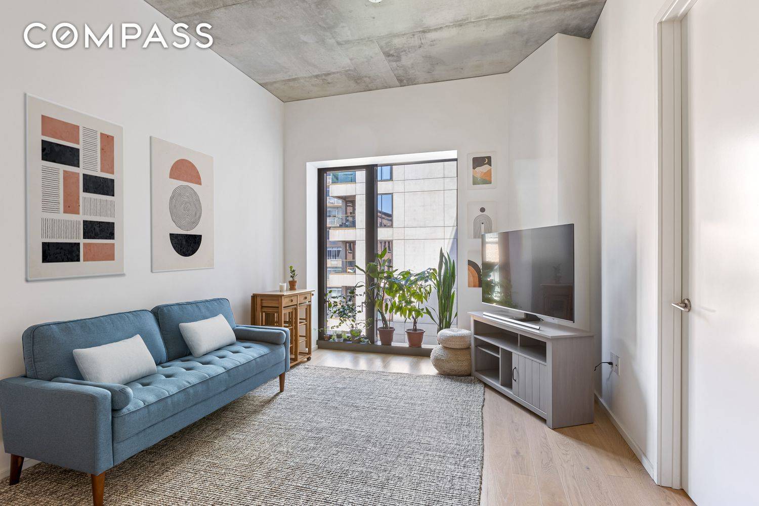 Welcome to Unit 7P at 98 Front Street, where modern luxury meets historic charm in the heart of DUMBO, Brooklyn.