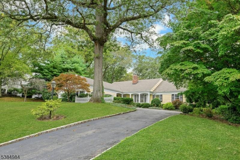 Tucked away in one of Morris Township's most sought after neighborhoods, this beautifully preserved 5B 3.