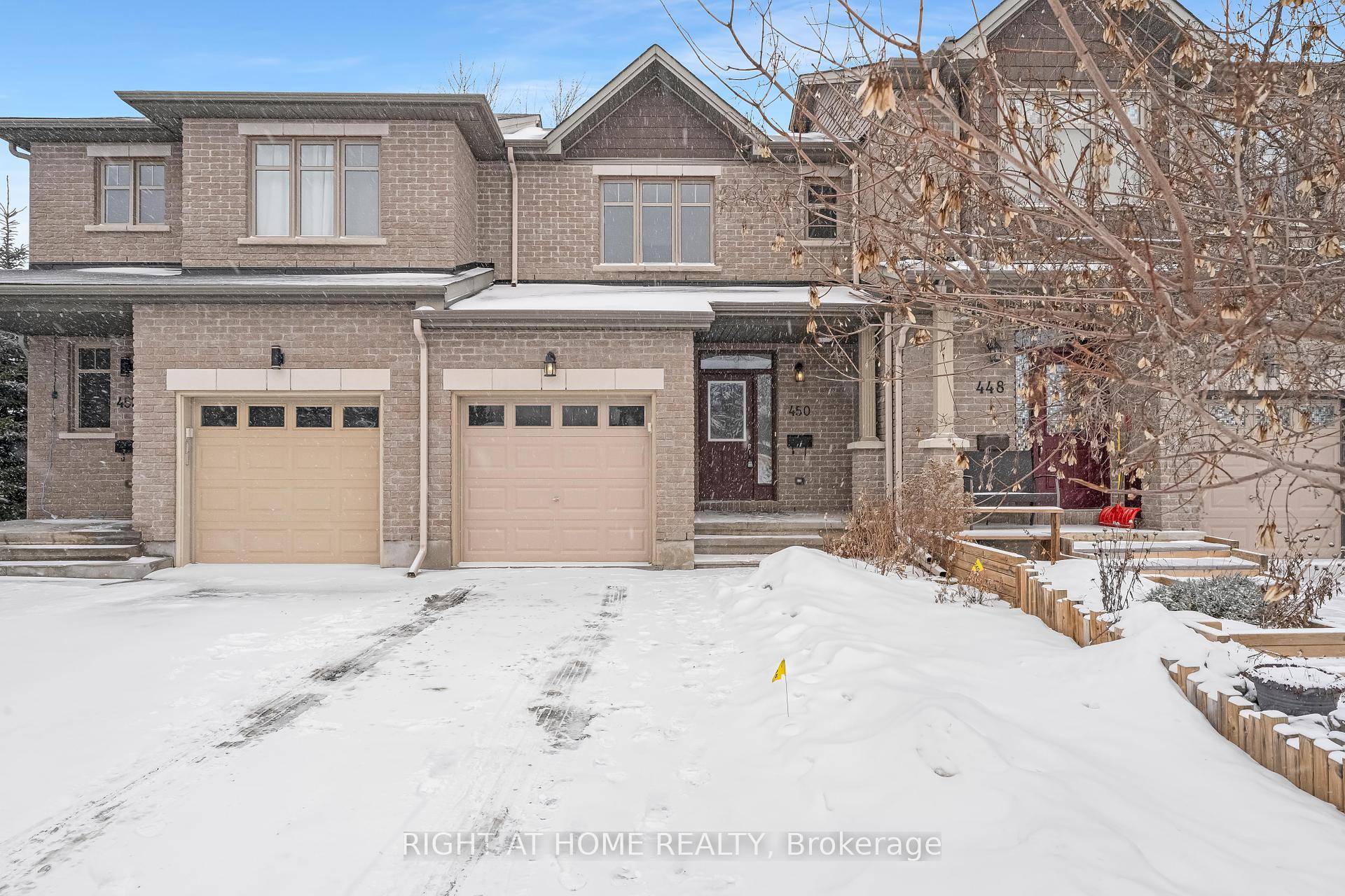 Stunning Claridge townhome nestled on a tranquil cul de sac boasts a premium extra deep lot !