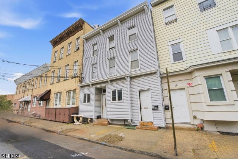 Legal 3 family investment opportunity just blocks from the 8th Street Light Rail, offering strong upside in one of Bayonne's fastest evolving pockets.