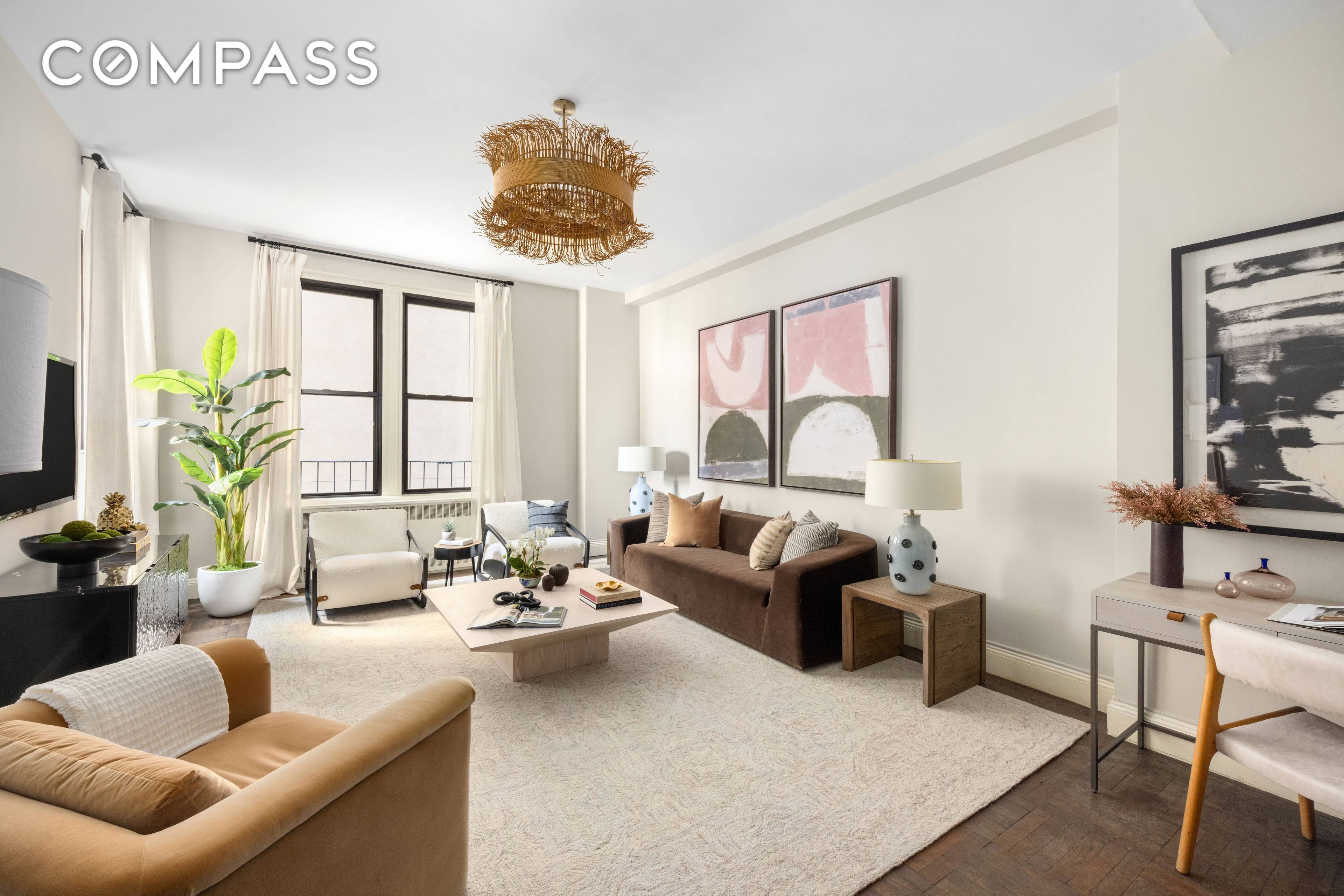 Classic Park Avenue elegance nestled in a distinguished full service co op, this serene five room home offers a blend of prewar detail and modern comfort.