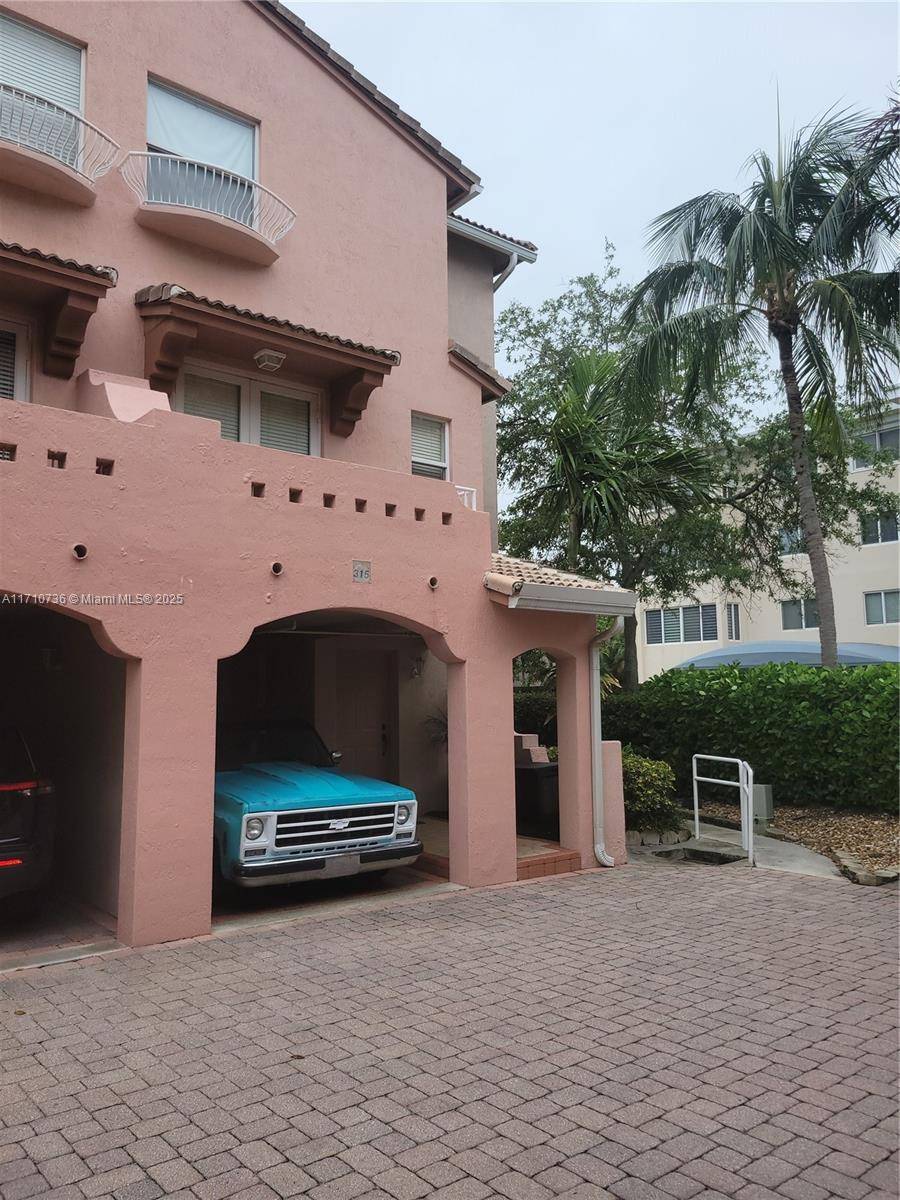 This beautiful 3story townhome located in Lauderdale By the Sea across A1A from the beach facing East.