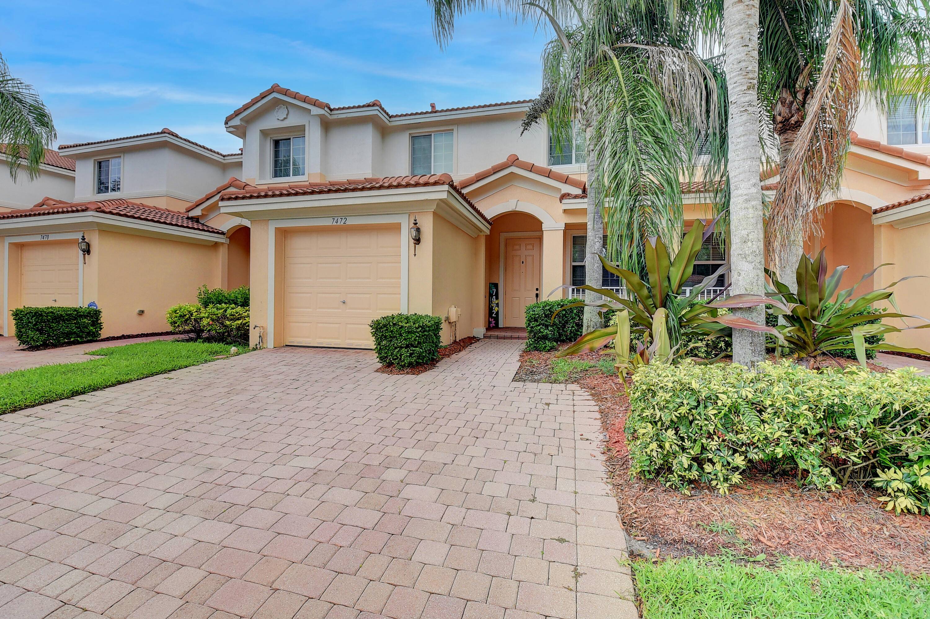 A MUST SEE ! ! ! Newly Remodeled Townhome at desirable Briella community in Boynton Beach.
