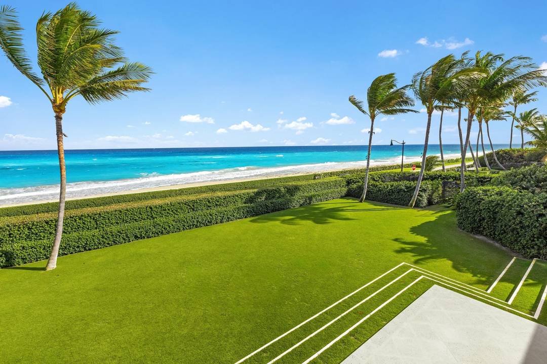 Perched on a rare, extraordinarily high elevation oceanfront parcel which sits as high as 23 feet and spans 3 4 of an acre, this completely renovated Palm Beach estate captures ...