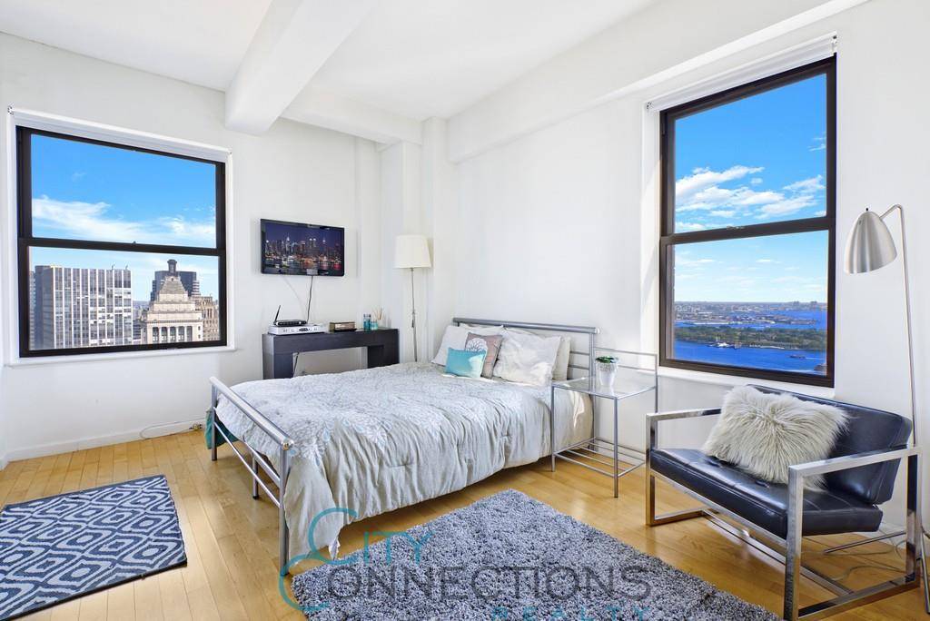 CYOF FOR 12 MONTH RENTAL Positively FABULOUS Corner Apartment with PANORAMIC CITY and WATER VIEWS !