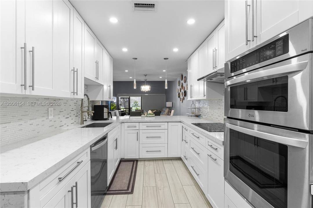 Beautiful 3 bedroom, 2 bath corner unit that feels just like a single family home, fully renovated VILLA with high quality finishes and modern upgrades throughout.