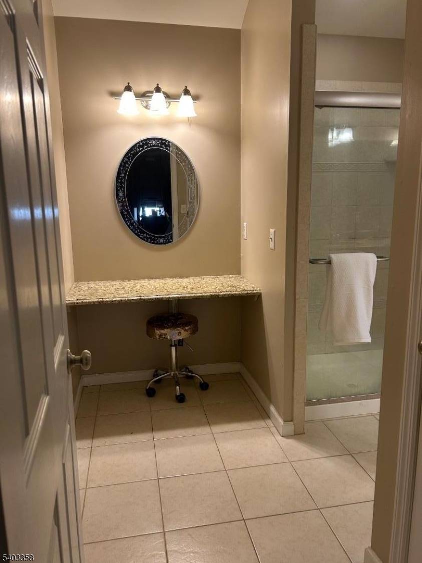 This is a 4 bedroom, 3 1 2 bath colonial home with full bathroom and 2 bonus rooms with large closets in the full finished basement.