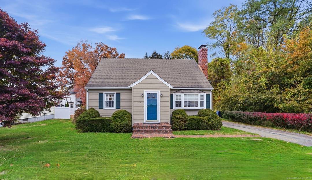 Welcome home to this charming 4 bedroom Cape Cod nestled on a beautiful level lot !