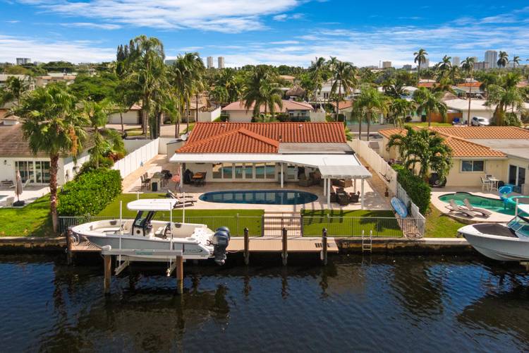 Welcome to this exquisite waterfront residence where luxury living meets modern comfort in one of Pompano Beach's most sought after neighborhoods.