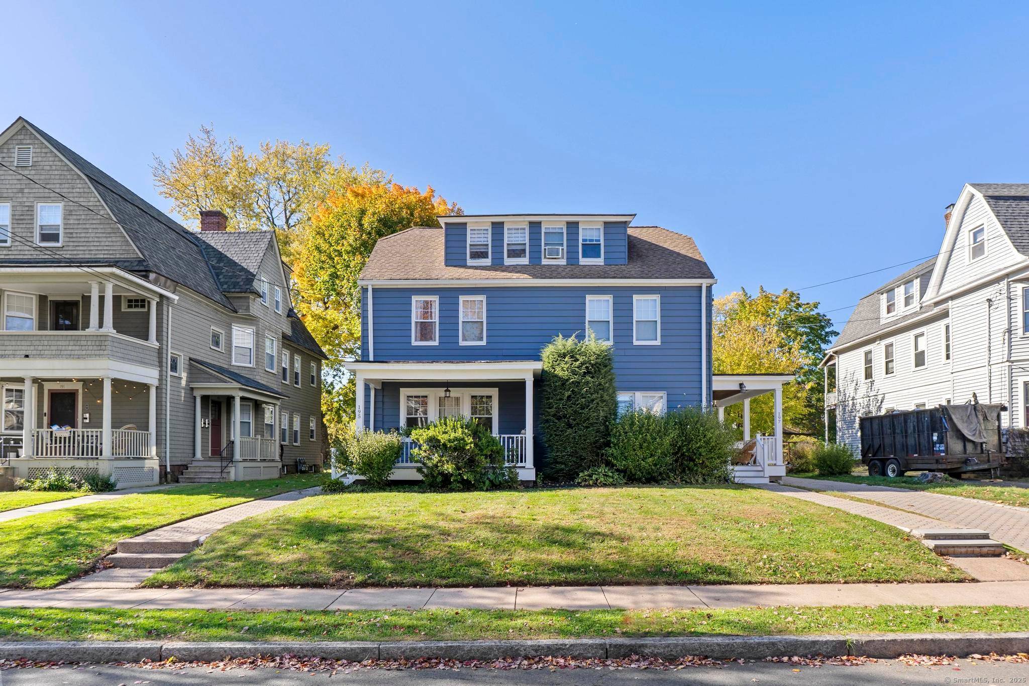 Rare investment opportunity in this beautifully maintained side by side two family home exudes character and craftsmanship throughout.