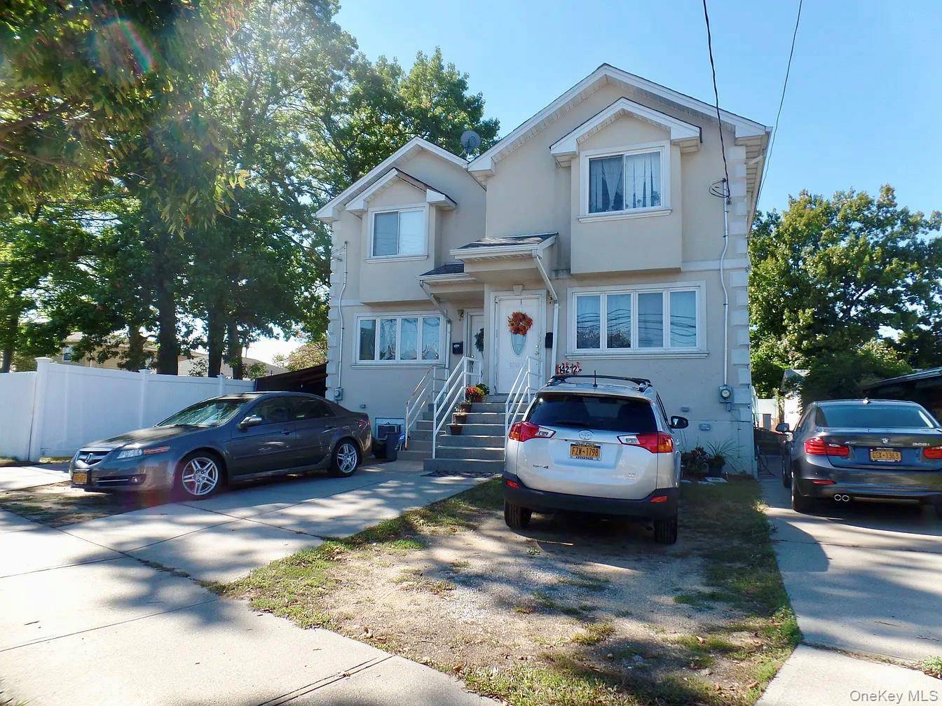 Welcome To This One Of A Kind Beautifully Maintained Single Family Home Located In A Charming Neighborhood Featuring Hardwood Floor Throughout.