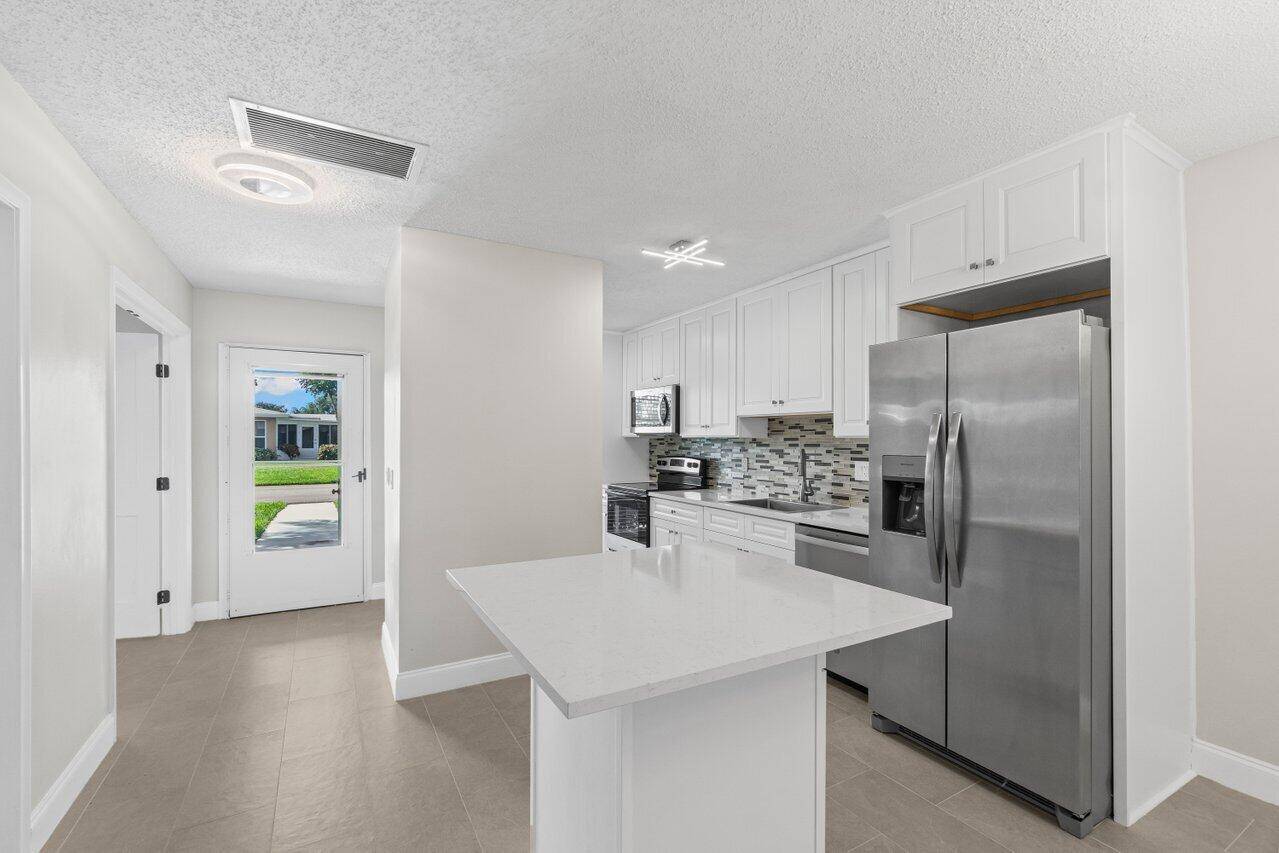 Welcome to this beautifully renovated 2 bedroom, 1.