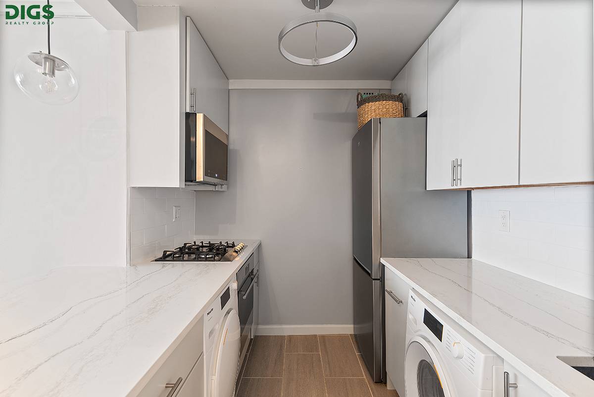 Move right into this beautifully renovated, quiet, sun flooded 2br 1ba home with a Miele W D !