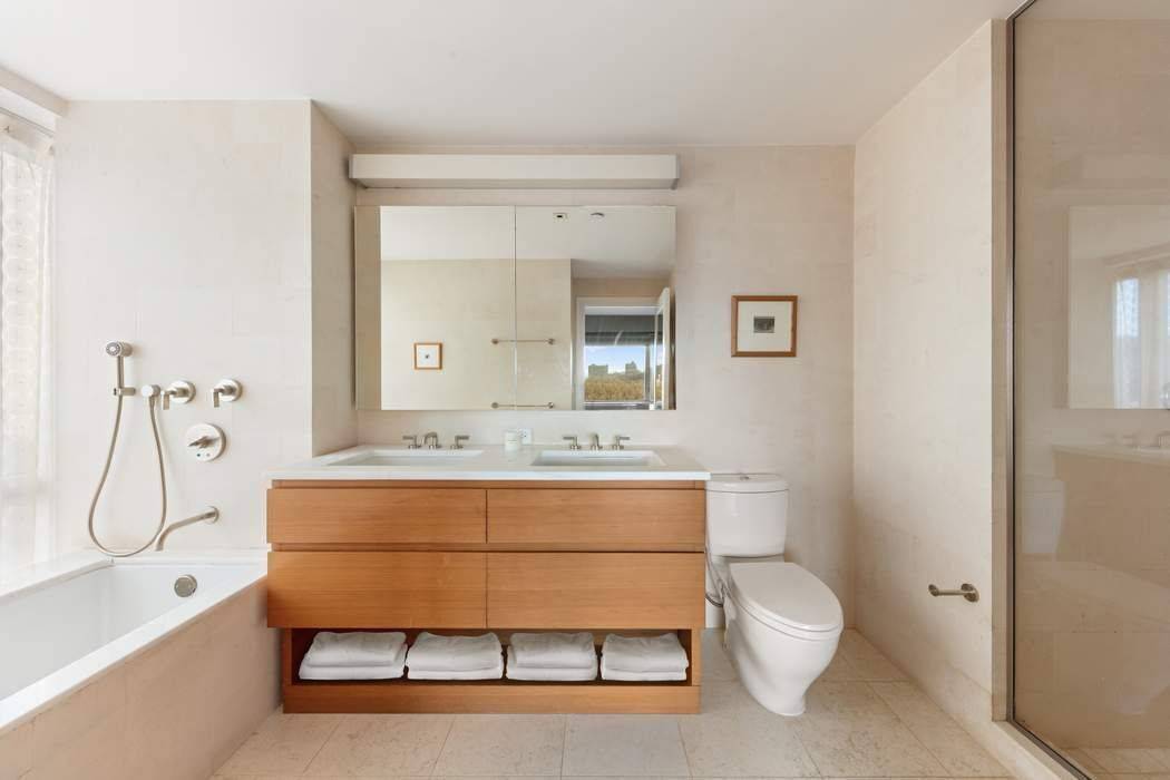 Move right into this exquisite one of a kind residence, a stunning light filled sanctuary located in the luxury One Museum Mile condominium, renowned architect Robert A.