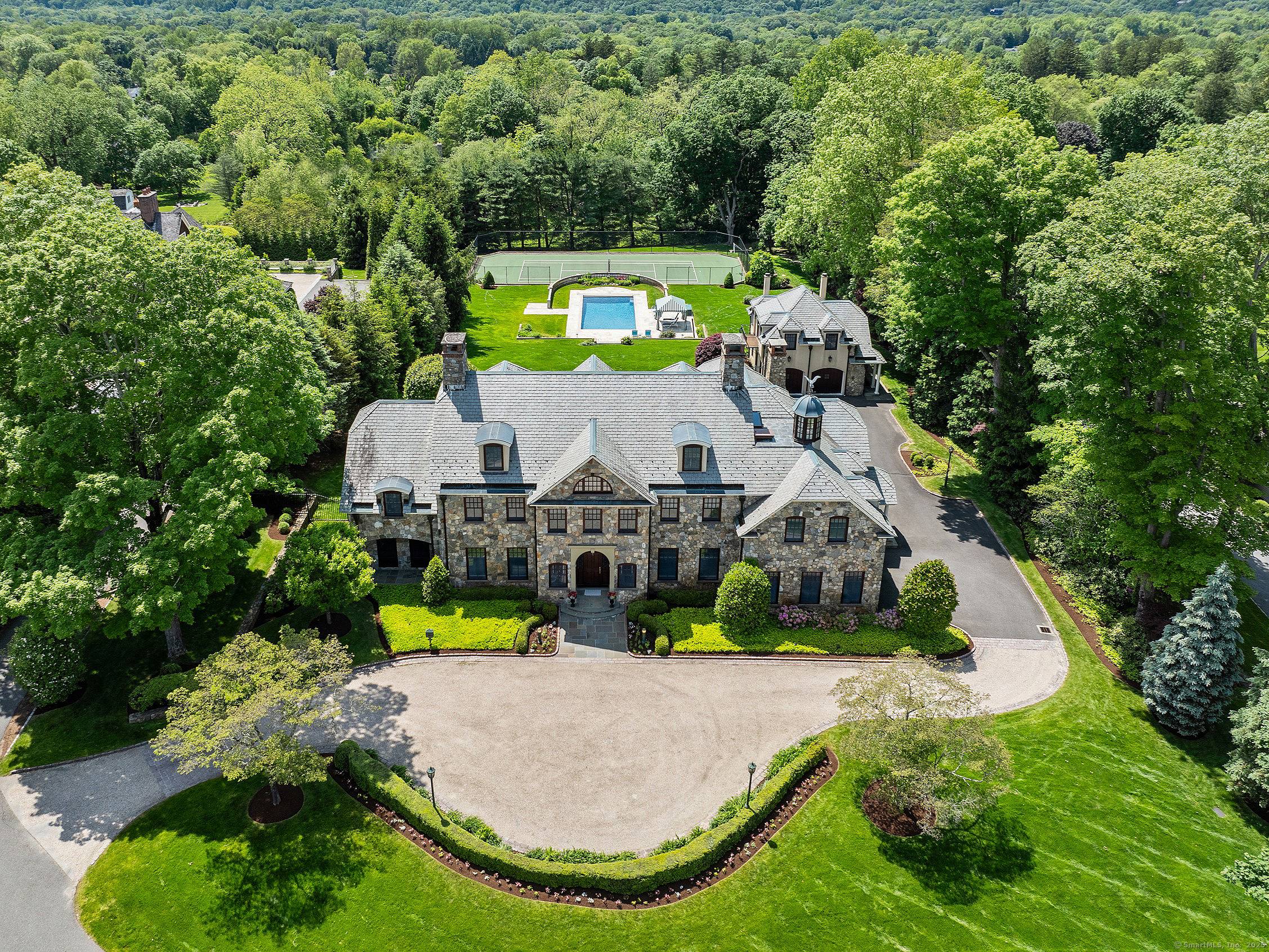 61 High Ridge Ave, a regal estate nestled in the heart of Ridgefield, CT's Historic District, with walking distance to downtown.