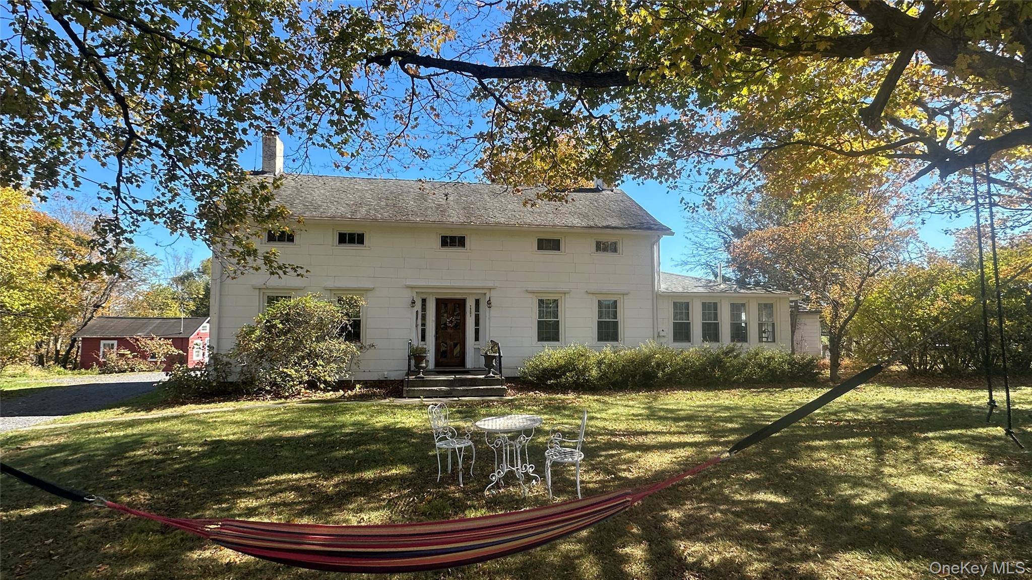 Stunning 26 acre compound with 2 move in ready guest cottages, expansive frontage on the Shawangunk Kill, in ground pool, pond, and views of the Gunks and Mohonk Tower.