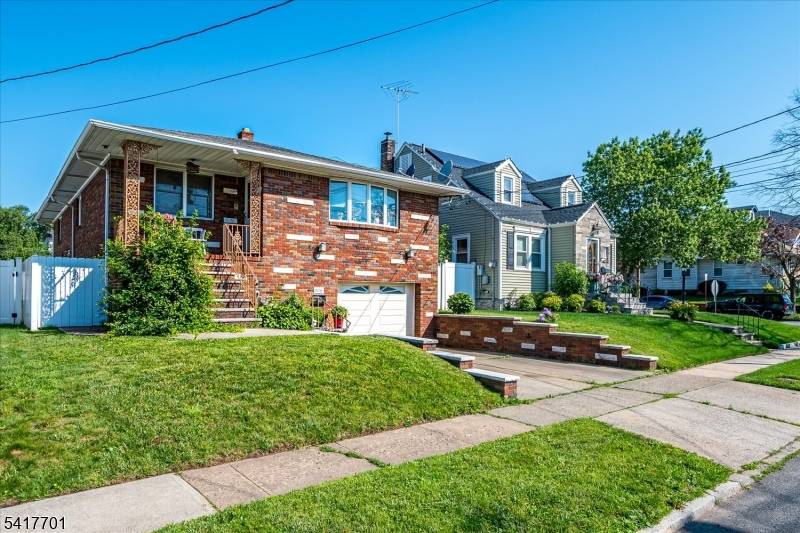 This 4 Bedroom, 3 Bath Meticulously Well Maintained Home Features a Fenced In Back Yard, Hardwood Flooring, Custom Wood Kitchen Cabinetry And More.