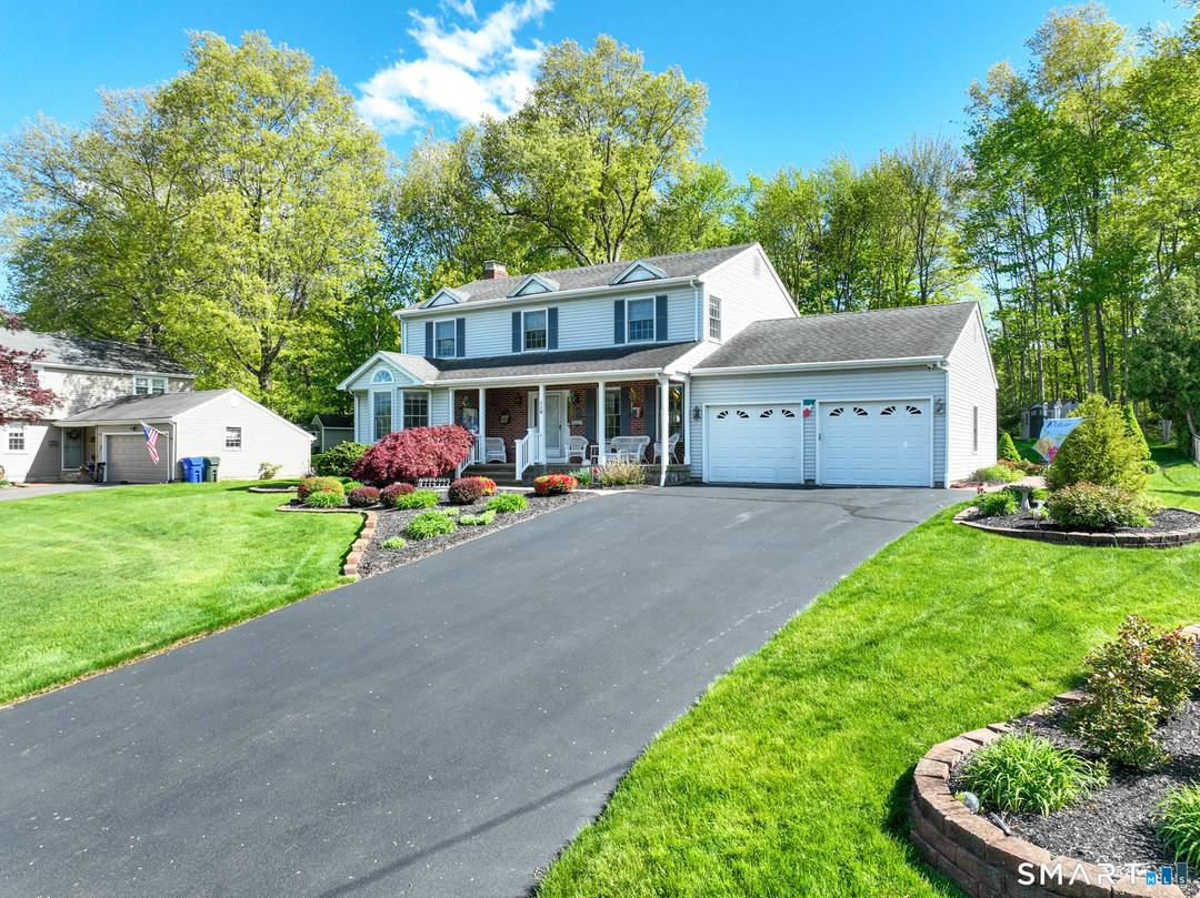 Step into this colonial's open foyer, upstairs offers 4 bedrooms 2 full baths.