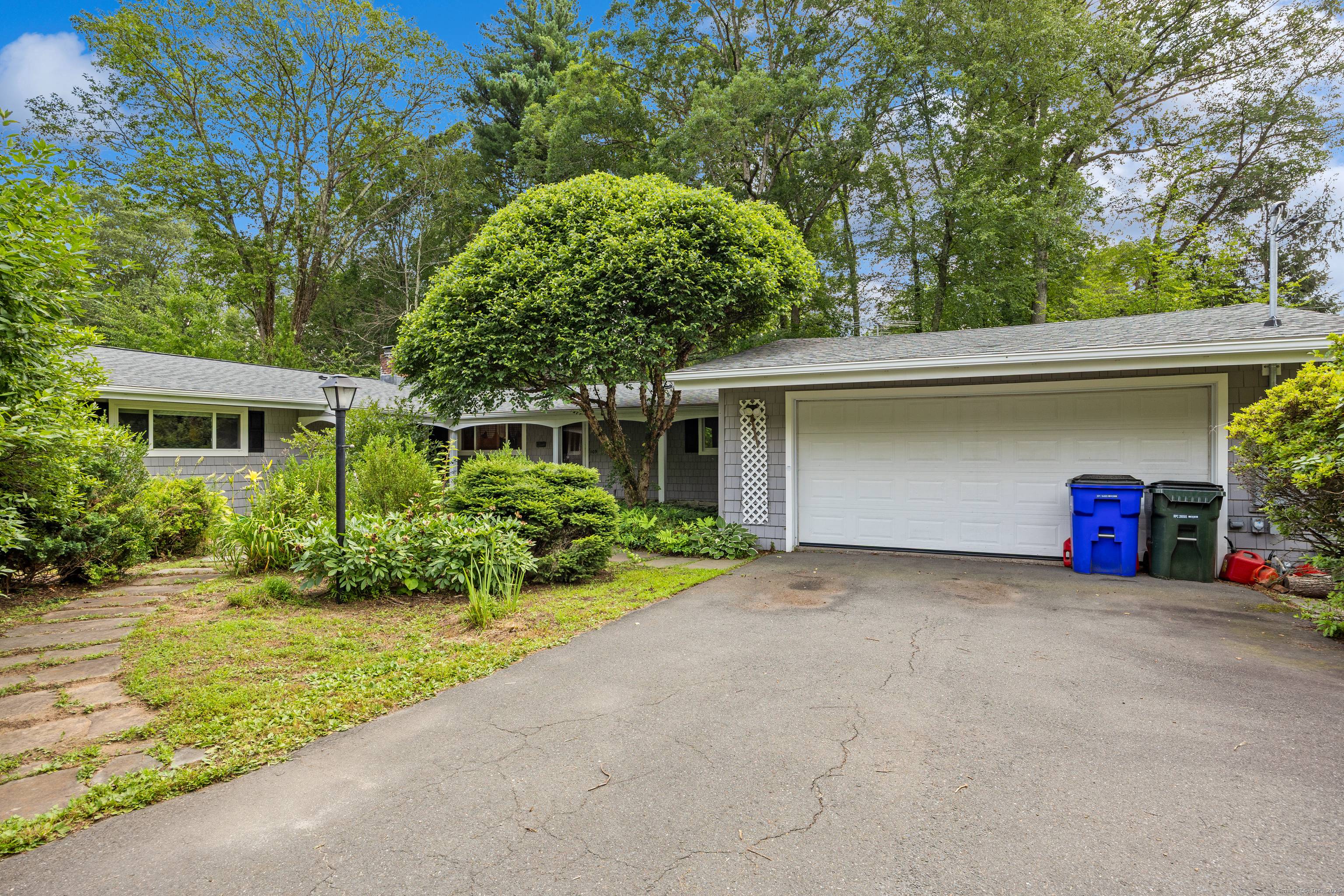 Welcome to 109 Country Club Road, a spacious and beautifully maintained ranch set on a generous.