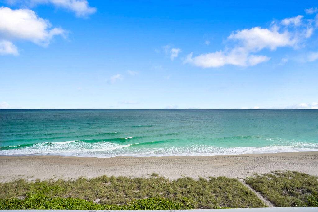 Enjoy the Million Dollar views of the Atlantic Ocean and the Indian River lagoon from this southern corner apt.
