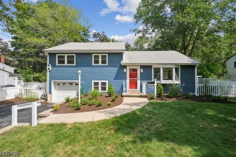 Nestled in a picturesque tree lined neighborhood.