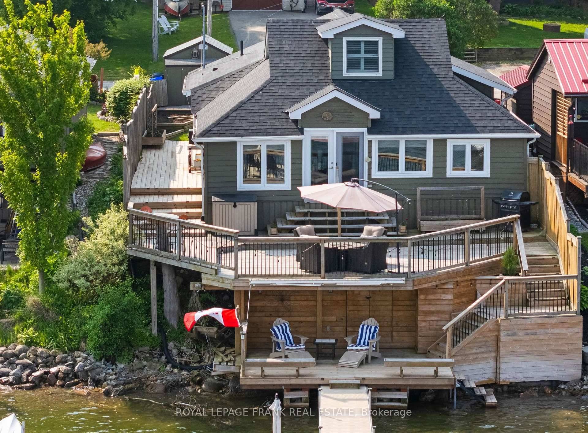 Waterfront, All season Living is calling from the shores of Lake Scugog in this warm and welcoming 4 bedroom retreat nestled in the heart of the Williams Point community.