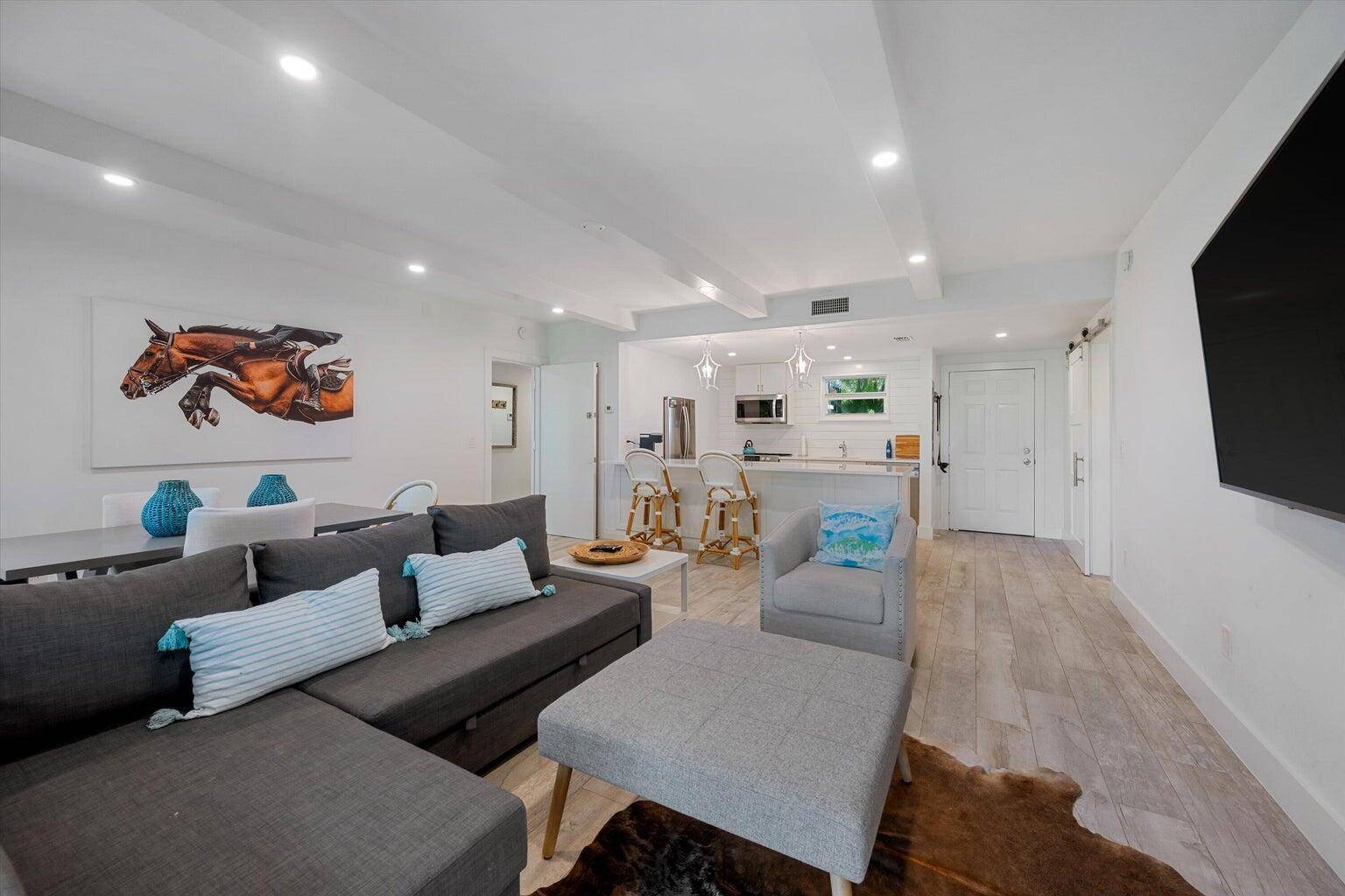Fully renovated in 2018, this beautifully appointed 2 bedroom, 2 bathroom apartment is located in the prestigious Palm Beach Polo gated community just minutes from WEF, Global, and polo facilities.