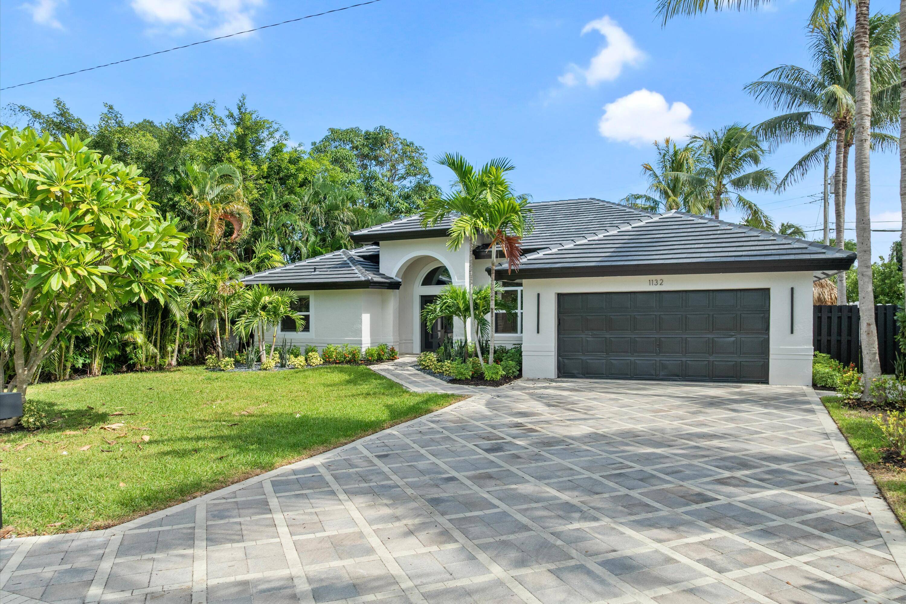 Located in Boca Raton's golden triangle, this newly renovated four bedroom modern home offers a short walk to Mizner Park 5th Ave Shops, and near to the beach and Boca ...