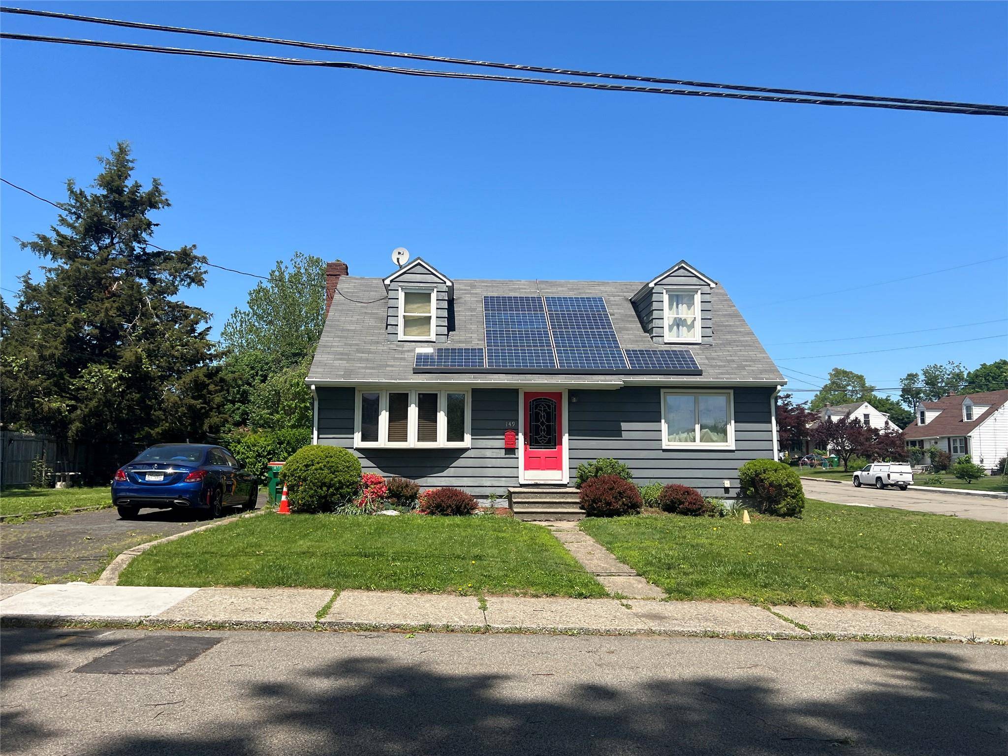 Four bedroom, one bathroom Cape Cod on a quiet corner lot in Beacon !