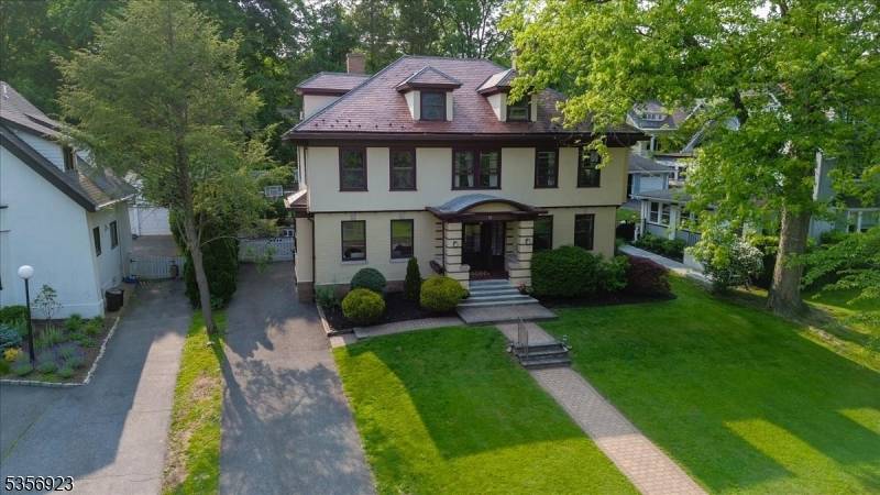 Discover this remarkable Craftsman Colonial, where timeless elegance meets refined modern living.