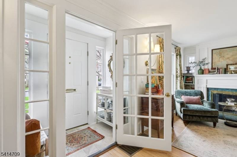 Welcome home to this beautifully appointed classic colonial, nestled in the sought after Gardens section, offering four levels of thoughtfully designed living space.